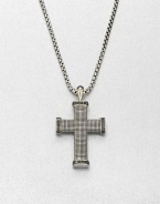 Black diamonds outline this exquisite cross pendant of sterling silver, suspended from a box chain necklace.Sterling silverBlack diamondLength, about 22Imported