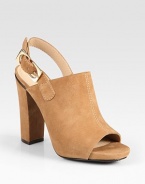 Modern suede mule sandal has a peep toe, substantial heel and an adjustable slingback strap. Self-covered heel, 4 (100mm)Covered platform, ½ (15mm)Compares to a 3½ heel (90mm)Suede upperLeather lining and solePadded insoleImportedOUR FIT MODEL RECOMMENDS ordering true size. 