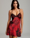 An unforgettable floral print canvases In Bloom by Jonquil's lace-accented, racerback chemise.