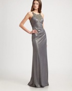 Shimmering and sleek, this festive, floor-length style is dressed up with an intricately beaded bodice.Beaded necklineSleevelessEmpire seamFully linedConcealed back zipAbout 51 from natural waist93% polyester/7% spandexDry cleanMade in USA of imported fabricModel shown is 5'10 (177cm) wearing US size 4. 