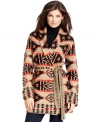 An ikat pattern emboldens Jones New York Signature's cardigan for a ski-chic look.