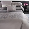 Beautiful leaves and branches adorn a comforter of soft colors. Comforter sets include comforter and two standard shams. Coordinates with Port Stripe sheets in Plum and Jagged Grid coverlet in Azuki.