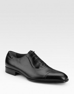 A handsome captoe design, crafted in Italy from the finest nappa leather. Leather lining and sole Made in Italy