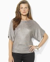 A sleek boatneck sweater crafted in a metallic knit exudes chic, cozy style with relaxed dolman sleeves.