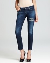 Distressed details lend the perfect on-trend edge to these sought-after skinnies by AG Adriano Goldschmied Jeans.