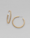 EXCLUSIVELY AT SAKS. Feminine filigree hoops, with dazzling pavé-set crystals. Crystal 18k goldplated Diameter, about 1½ Post back Imported