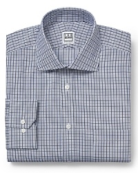 Demonstrate your eye for excellence with this handsome check dress shirt from Ike Behar, a decidedly refined button-down for your workweek rotation.