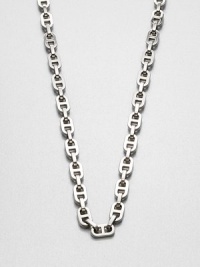 A modern link style in sleek silvertone. Ion-plated brassLength, about 18Fold-over clasp closureImported 