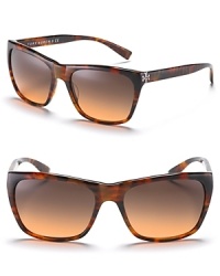 Tory Burch takes a look at the past for these modern shades. With logo detail on temple and nose tabs to secure fit.