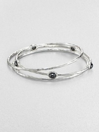 From the Rock Candy® Collection. A trio of hammered, sterling silver bangles accented with rich, faceted hematite. Sterling silverHematiteDiameter, about 2.5Slip-on styleImported 