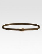 A sleek, skinny ring of waist-cinching leather.About 40 x 1 Leather Buckle closure Imported