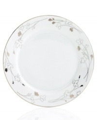 Wildflowers take off on glazed white porcelain, sparkling as they tumble aimlessly around these Platinum Silhouette Round dinner plates from Charter Club dinnerware. The dishes have a banded edge that adds a classic touch to a pattern with modern spirit.