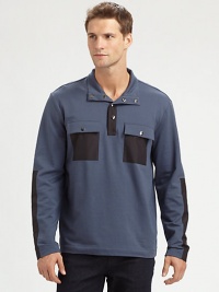 Fleece pullover with modern inspirations, accented with nylon contrasting trim and double-chest pockets for a handsome finish.Button-front95% cotton/5% lycraMachine washImported