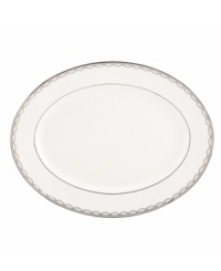 Sturdy bone china draped in a delicate platinum garland makes the Iced Pirouette platter by Lenox a flawless go-to for formal entrees.