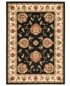 Bring the brilliance of ancient Persian textile design home with this dark and captivating Lyndhurst area rug from Safavieh. Crafted from soft polypropylene, this rug radiates timeless allure with the added convenience of easy-care construction. (Clearance)