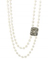 Elegant and sophisticated, this stunning two-row necklace combines cultured freshwater pearls (5-1/2-6 mm) with a marcasite-accented spacer (5/8 ct. t.w.). Set in sterling silver. Approximate lengths: 18 inches and 21 inches.