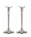 Cast your home in a more beautiful light with Godinger candlesticks. A classic tulip shape defines a polished aluminum pair to accentuate any setting.