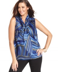 A bold color and unique print up the ante on a plus size blouse from Kasper. Wear the bow tied for extra feminine flair.