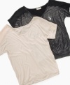 Fun brilliant short sleeve top by Baby Phat has dazzling glitter to use in any occasion.