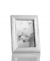 Martha Stewart Collection brings a natural look to lustrous silver plate with the sophisticated Silver Grain picture frame. With velvet backing.