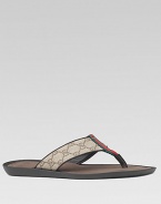 Thong sandal in GG plus fabric with leather trim and signature web. Rubber sole Made in ItalyPlease note: For best fit please size down one full size.