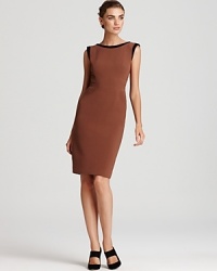 A no-nonsense approach to your workweek style, this Rachel Roy dress strikes at a distance with a minimalist silhouette and sleek tailoring. Keep the look strong with sculptural heels.