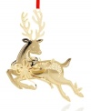 A majestic reindeer leaps with glee in brilliant gold-plated brass with the intricate cut detail of all ChemArt ornaments.