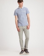 Cotton pique polo gets a modern update with contrasting buttons and buttoned-down collar, in a lightweight, slubbed finish.Four-button placketChest welt pocketCottonMachine washImported