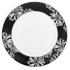 First at Bloomingdale's. These bold black and white patterns are made to mix and match. Choose five-piece place settings in floral Dogwood Point, banded Nag's Head or striped Pinney's Beach. Dogwood Point shown here.