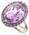 Violets in bloom. This darling cocktail ring from Givenchy showcases an oval-cut glass stone in violet hues, surrounded by smaller, round-cut accents. Crafted in silver tone mixed metal. Size 7.