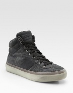 High-top lace-up trainers are crafted in a substantial wool/cashmere flannel with soft shearling lining for a warm, winter-ready fit. Leather lining Rubber sole Made in Italy 