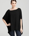 Let casual wear flow free in this DIANE von FURSTENBERG poncho style top. A relaxed, boxy fit speaks to stylish comfort.