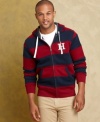 Load up on preppy layers this season with this varsity-inspired hoodie from Tommy Hilfiger.