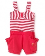 This swimsuit-inspired romper features a faux bandeau top with bold stripes and solid bottoms with side pockets.