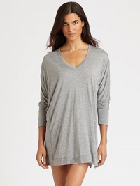 Softest modal jersey draped from shoulder to hem in a cozy tunic-length pullover.V-neckDropped shouldersDolman sleevesGathered back88% modal/12% viscoseHand washImported