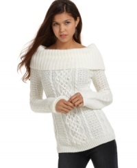 Snuggle up in JJ Basics' body-con sweater. Perfect for your fall-wardrobe, the cable knit detail is preppy-cool!