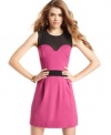 Dark accents compliment the structured design of this colorblocked party dress from Jessica Simpson!