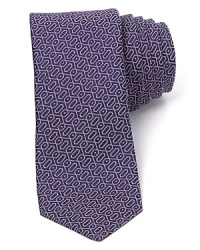 Unusual pattern, rich color, a skinny silhouette - this tie will make a strikingly statement with your suit.