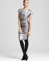 Dramatic ruched details add texture and definition to this glamorous Alice + Olivia dress, energized with on-trend metallic sparkle--our latest obsession.