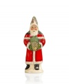 Santa Claus hand delivers a bit of Christmas sparkle to your home in this handcrafted figurine. A classic red coat design is accented with black for a touch of contemporary charm. From Vaillancourt.