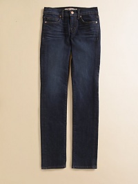 Jeans and leggings in one, in a medium wash with subtle front whiskering and classic 5-pocket jean details.Waistband with belt loops and button close Front zip fly Front pockets, including coin pocket, with rivet details Back patch pockets Whiskering across thighs Skinny fit Cotton/polyester/spandex; machine wash Made in USA