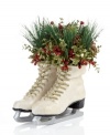 A fresh pair. Filled with holiday bouquets, these frosted white ice skates offer a whimsical expression of the season.