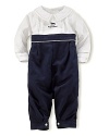 A cotton coverall is crafted with nautical-inspired touches and an embroidered rocking horse for a playful finish.