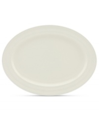 Elegance comes easy with the Fair Harbor oval platter. Durable stoneware in a milky white hue is half glazed, half matte and totally timeless. From the kate spade new york dinnerware collection.