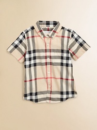 Fashioned in the renowned check design, this breezy cotton button-down features a shirttail hem and patch pocket.Button-down collarShort sleevesButton-frontFront patch pocketShirttail hemCottonMachine washImported Please note: Number of buttons may vary depending on size ordered. 