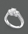 A three-stone ring with vintage appeal featuring round-cut diamonds (1-1/2 ct. t.w.) set in 14k white gold.