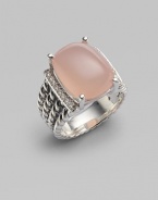 From the Wheaton Collection. A faceted cushion of milky pink opal, edged by rows of diamonds, in a wide cable band of sterling silver.Diamonds, 0.16 tcw Pink opal Sterling silver Width, about ½ Imported