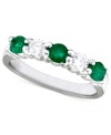 Let glowing green emeralds (5/8 ct. t.w.) and round-cut diamonds (1/4 ct. t.w.) add rich elegance and color to every day with this 14k white gold ring from Effy Collection.