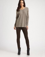 Draped wool and cashmere v-neck has dropped shoulders, long dolman sleeves and a hi-low hem that hits below the hips. V-neckDropped shouldersLong dolman sleevesHi-low hem hits below the hips70% wool/30% cashmereDry cleanImportedModel shown is 5'10 (177cm) wearing US size Small.