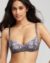 Floral embroidered applique lends luxe style to this lady-like underwire demi bra from Blush. Style #0224907